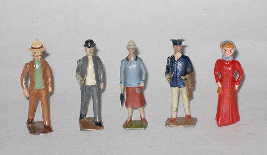 Britains Set No. 168, scarce civilians including lady in long red coat, man in Panama hat, yachtsman, flapper and man walking with pipe, five figures, prewar. Estimate: $250-$350. Image courtesy of Old Toy Soldier Auctions.